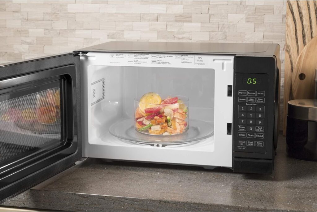 GE Countertop Microwave Oven | 0.7 Cubic Feet Capacity, 700 Watts | Kitchen Essentials for the Countertop or Dorm Room | Stainless Steel