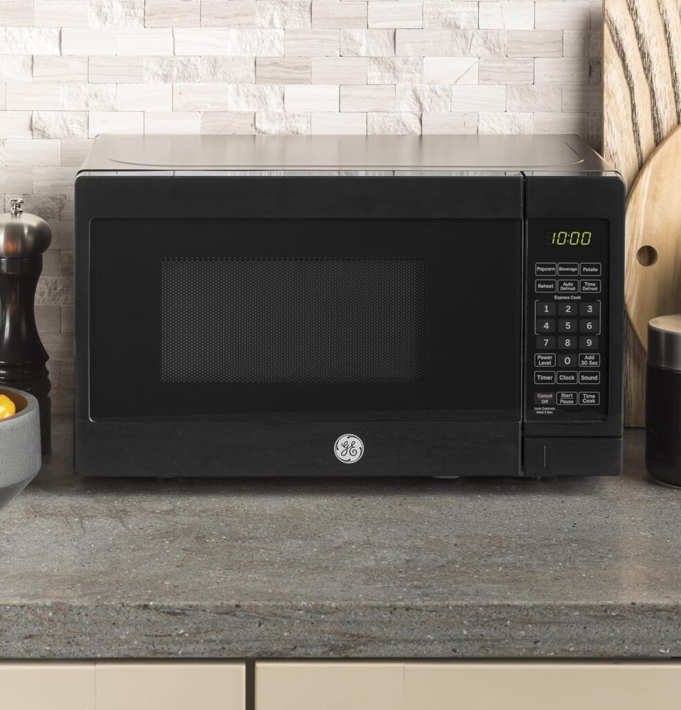 GE Countertop Microwave Oven | 0.7 Cubic Feet Capacity, 700 Watts | Kitchen Essentials for the Countertop or Dorm Room | Stainless Steel